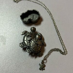 A vintage turtle jewelry box